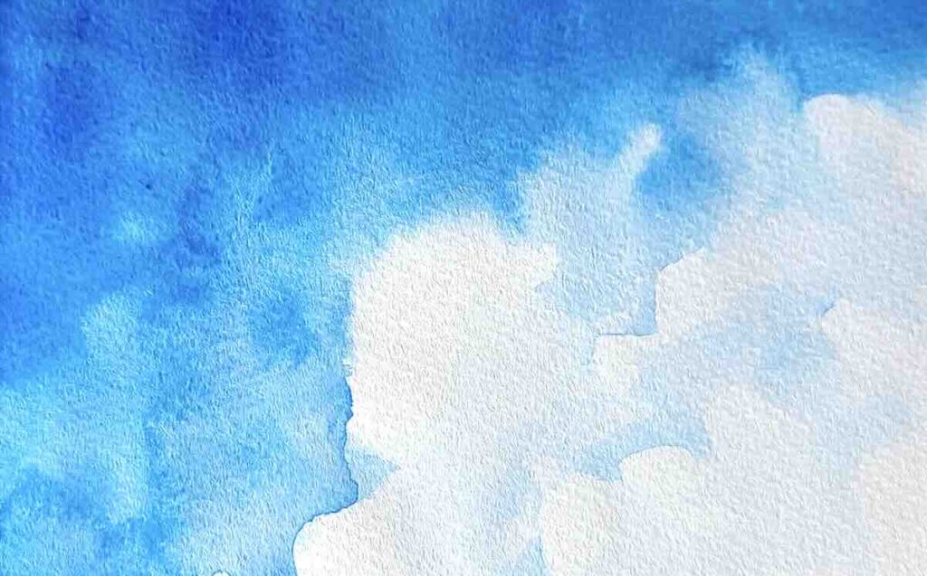 青空の中に、ウェット・オン・ウェットで描かれた白く輝く入道雲の作例